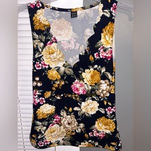 Dress shirt or tank top, you could dress this up or dress this down.